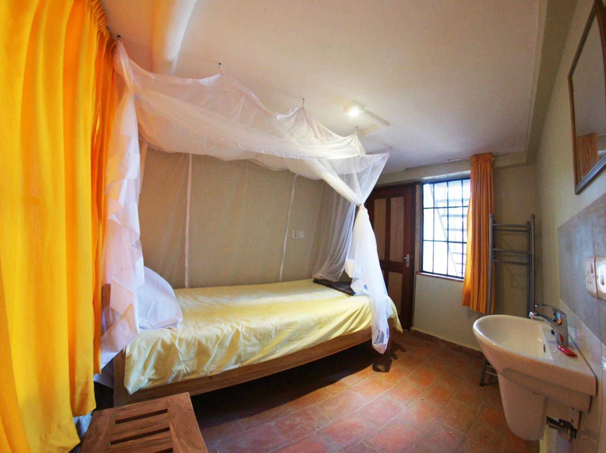 Yellow Haven Lodge Kampala Habitación foto